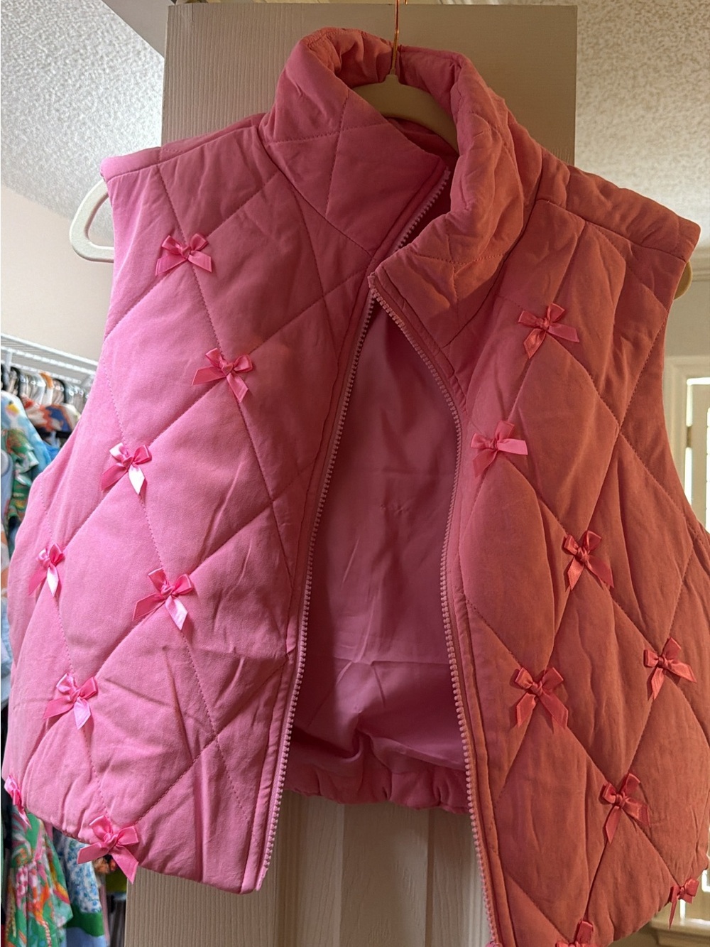 Womens Pink Quilted Bow Puffer Vest